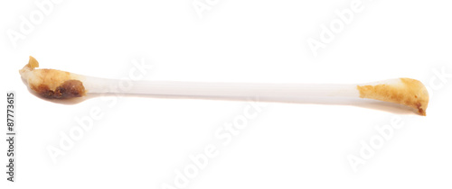 Canvas Print Ear wax on cotton swab isolated on white background