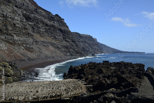 Cabaña con tejado de colmo en la playa del Verodal. Islas de El Hierro. Tenerife. Canarias  photo