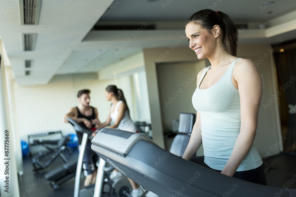 Young woman training in the gym Young woman training in the gym