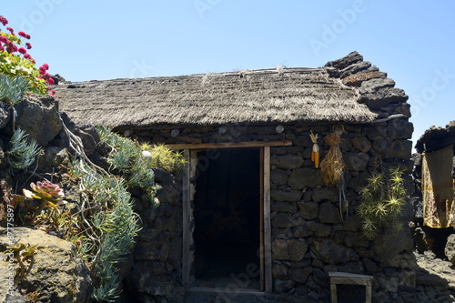 Reconstrucción de una casa de piedra de los Bimbaches. Ecomuseo de Guinea. Isla de El Hierro. Tenerife. Canarias. photo