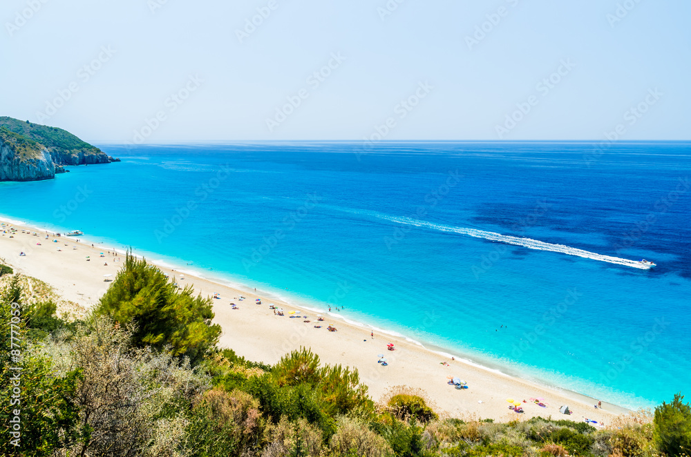 Milos beach on Lefkada island, Greece. Milos beach near the Agios Nikitas village on Lefkada, Greece Milos beach on Lefkada island, Greece. Milos beach near the Agios Nikitas village on Lefkada, Greece