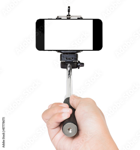 hand using selfie stick isolated white clipping path inside photo