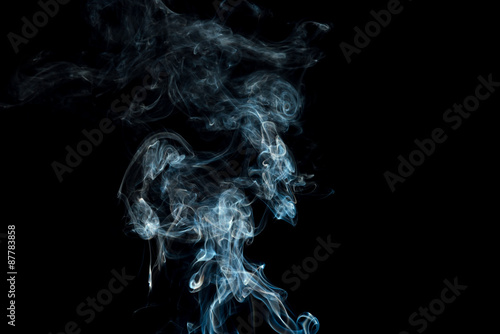 Movement of white smoke on black background