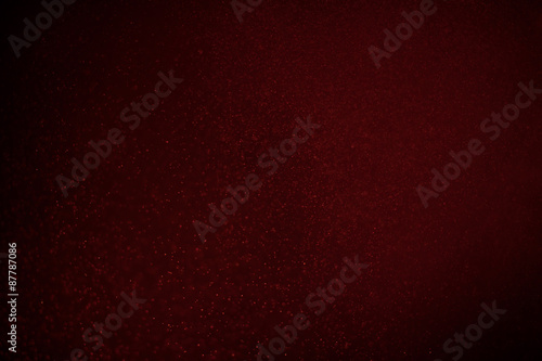 abstract dark bokhe lights background , rede,black and subtle gold. defocused background