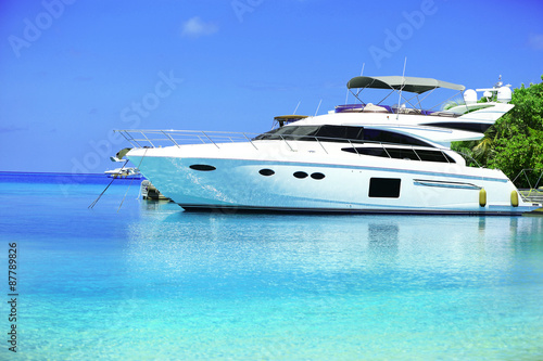 Yacht parked at jetty in Baros Maldives © Africa Studio