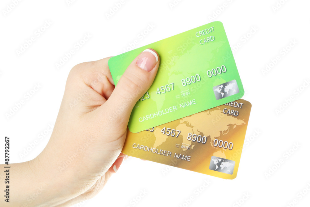 Hand holding credit cards, isolated on white Hand holding credit cards, isolated on white
