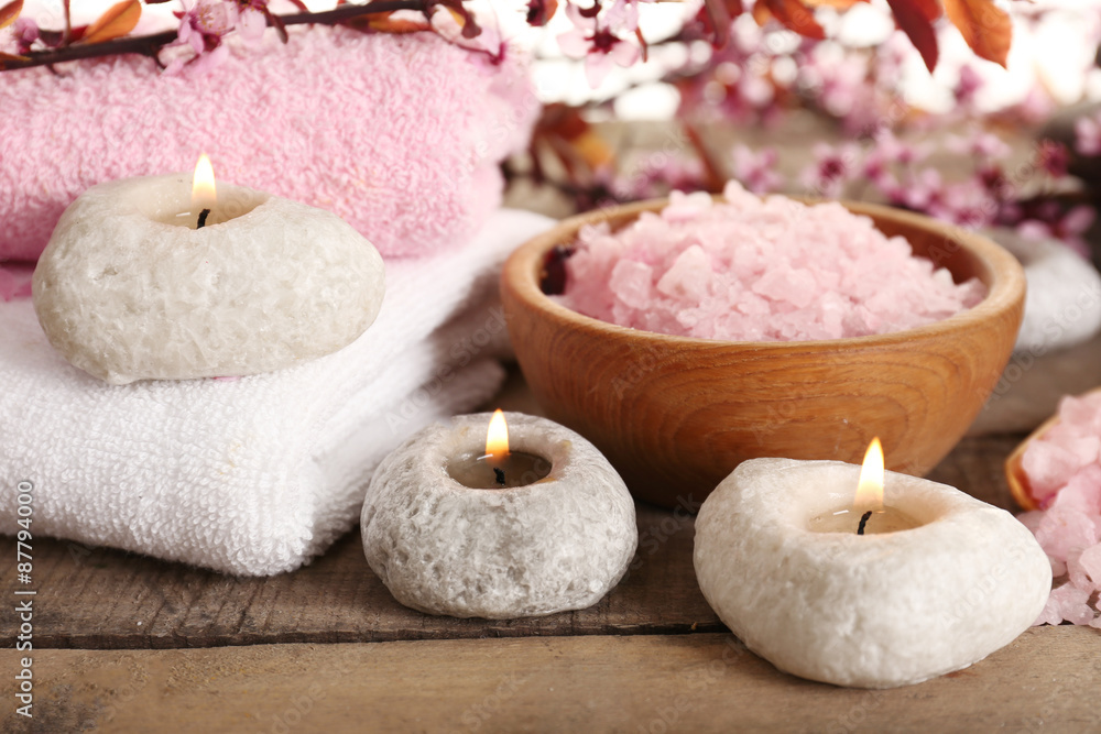Beautiful spa composition with spring flowers on table close up Beautiful spa composition with spring flowers on table close up