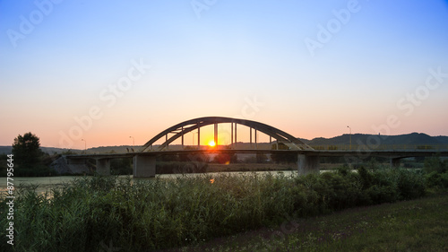 Bridge on the river in colourful sunset © Bojan Todorović 