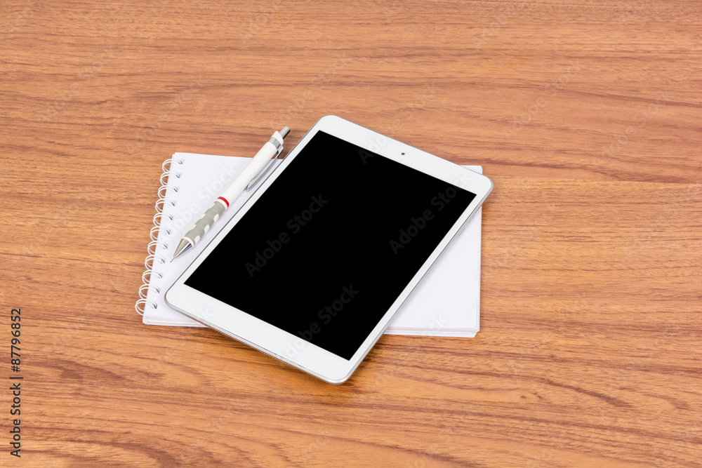White digital Tablet on wooden White digital Tablet on wooden
