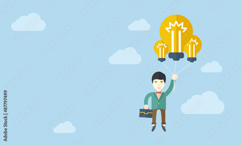 Asian businessman carrying a briefcase with bulb. Asian businessman carrying a briefcase with bulb.