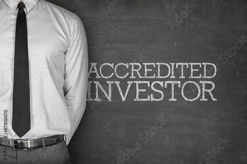 Accredited investor text on blackboard photo