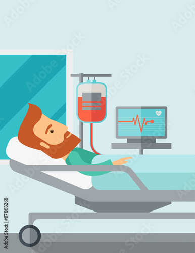 Patient in hospital bed being monitored