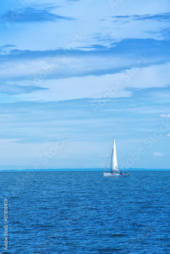 Boat Sailing at Blue Sea © Bits and Splits