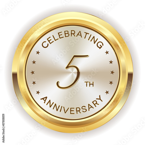 White 5th anniversary badge with gold border on white background