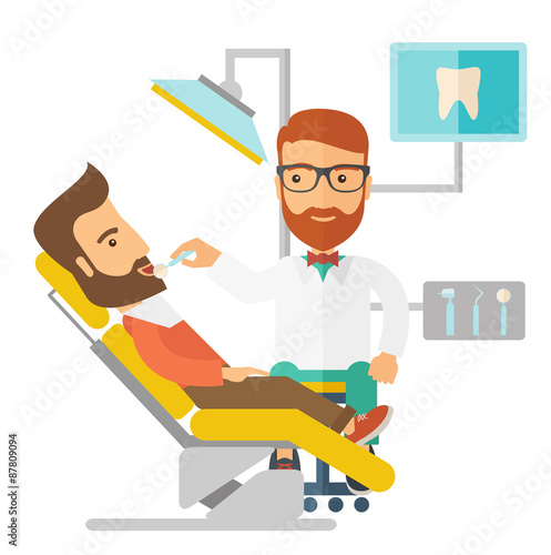 Dentist man examines a patient teeth in the clinic