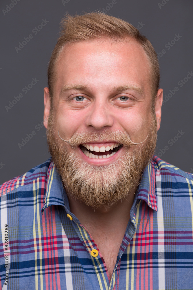 Obraz premium Laughing bearded man