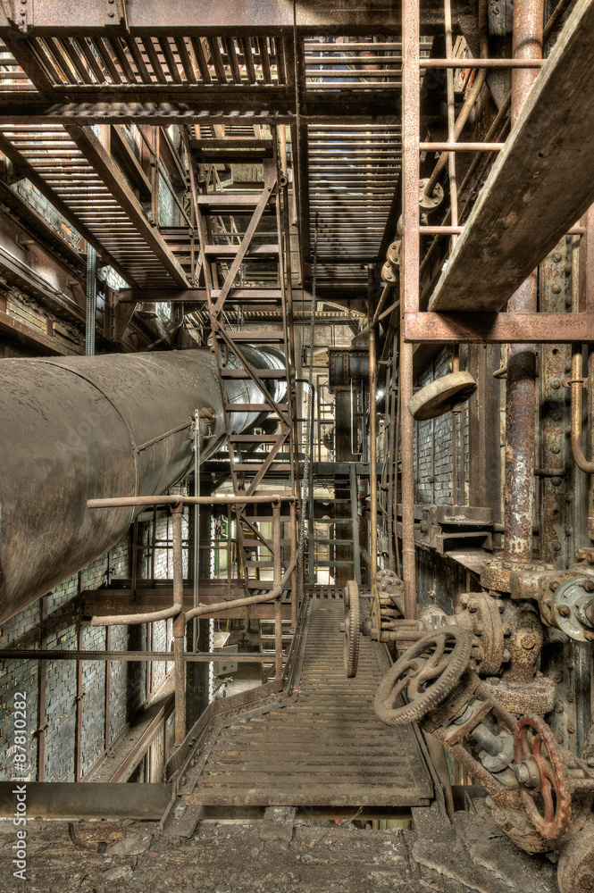 Old and rusted elements in an abandoned power plant