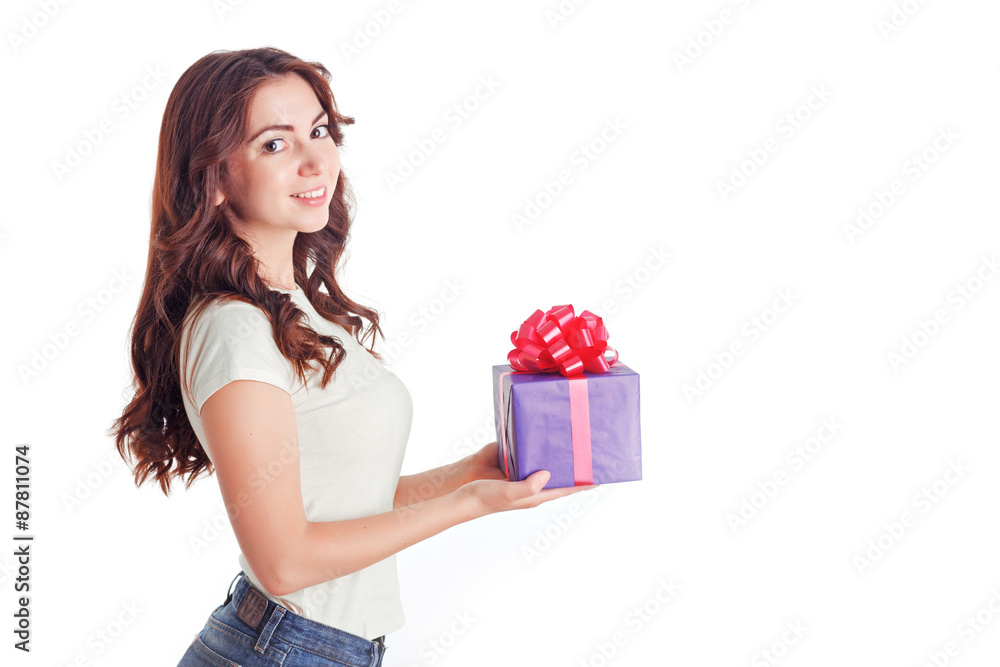 Smiling nice girl holding present Smiling nice girl holding present