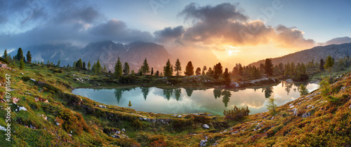 Mountain alps lake sunset panorama in Dolomites