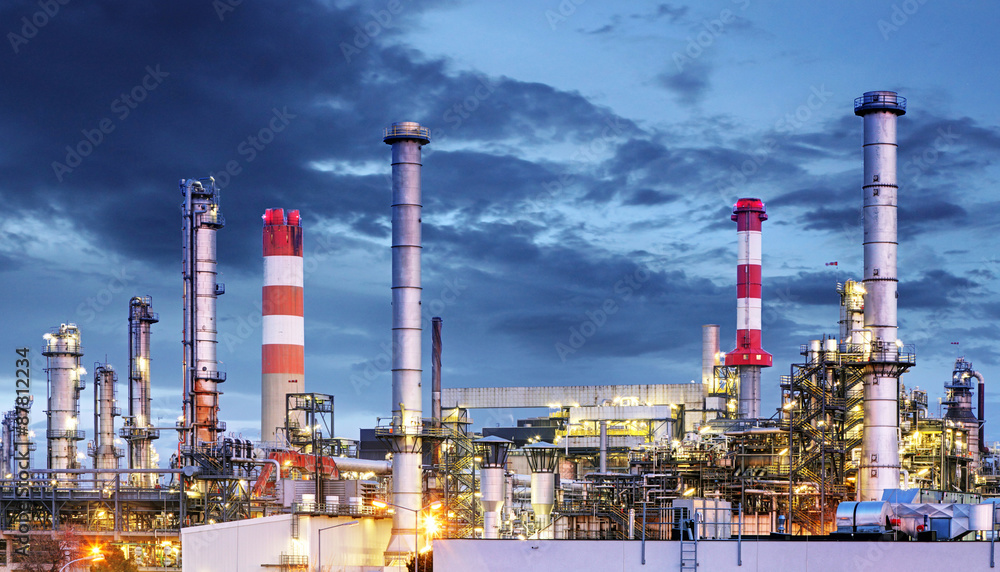 Petrochemical plant at night, oil and gas industrial Petrochemical plant at night, oil and gas industrial