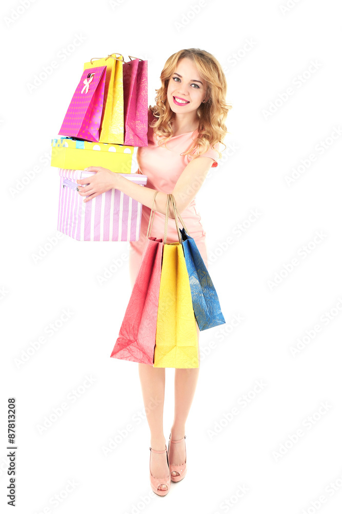 Beautiful young woman with shopping bags and boxes isolated on white Beautiful young woman with shopping bags and boxes isolated on white