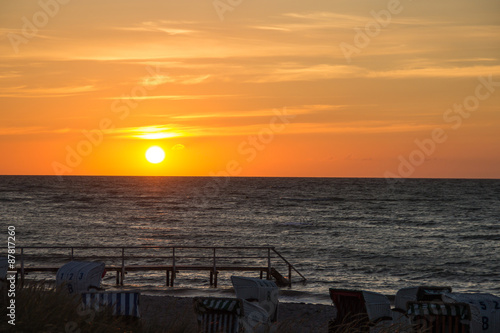 Sonnenuntergang am Strand von Heiligenhafen an der Ostsee..Sunset on the beach of Heiligenhafen on the Baltic Sea