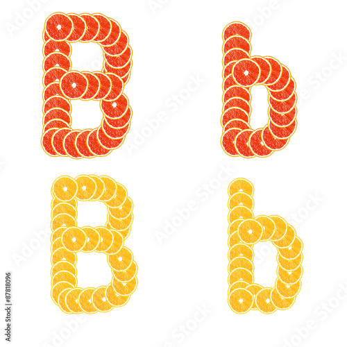 Letters stacked slices of orange and grapefruit to create inscri
