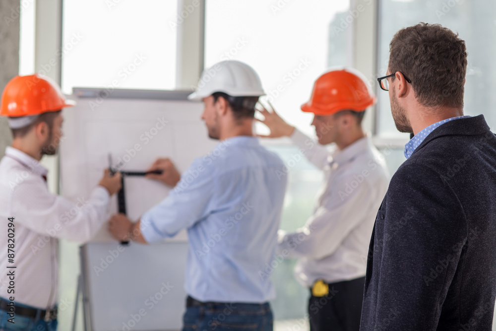 Successful construction team is working on a project Successful construction team is working on a project