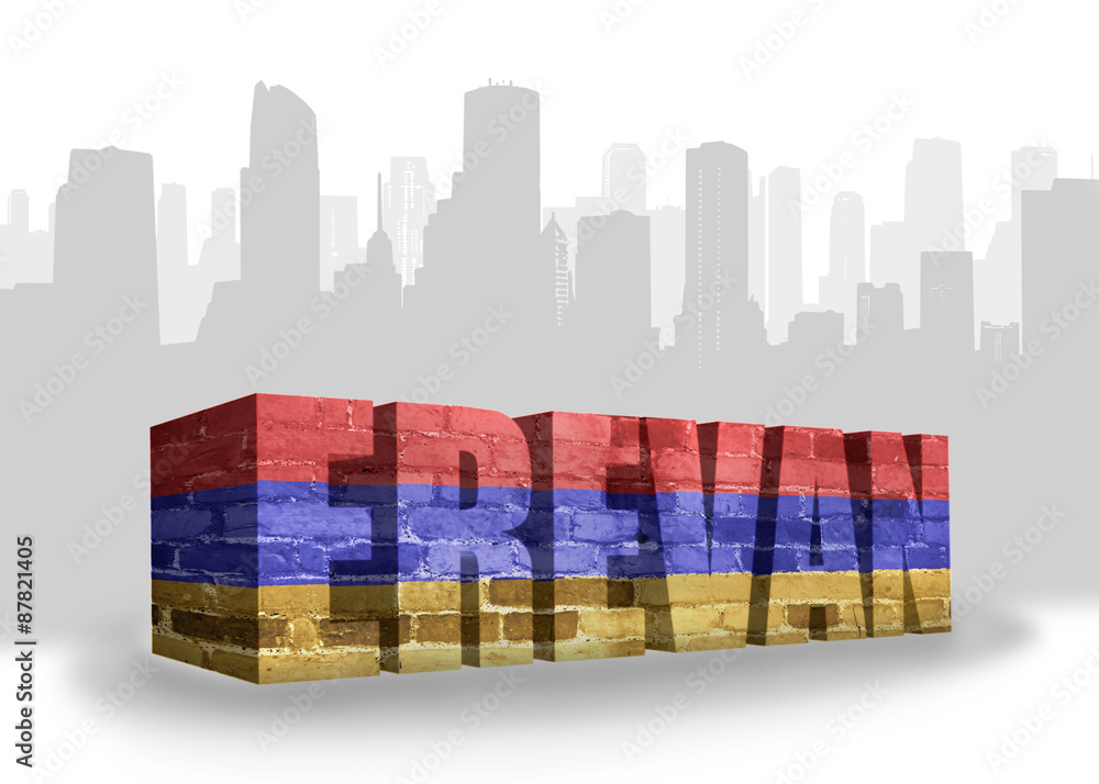 Fototapeta premium text yerevan with national flag of armenia near abstract silhouette of the city