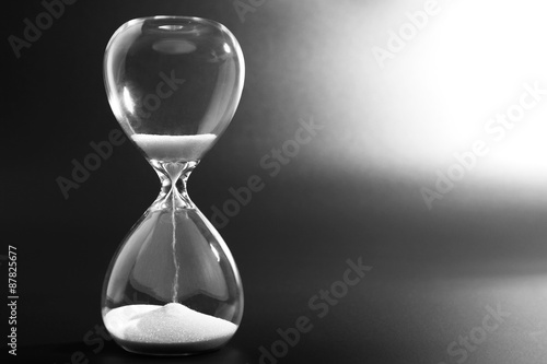 Hourglass on dark background