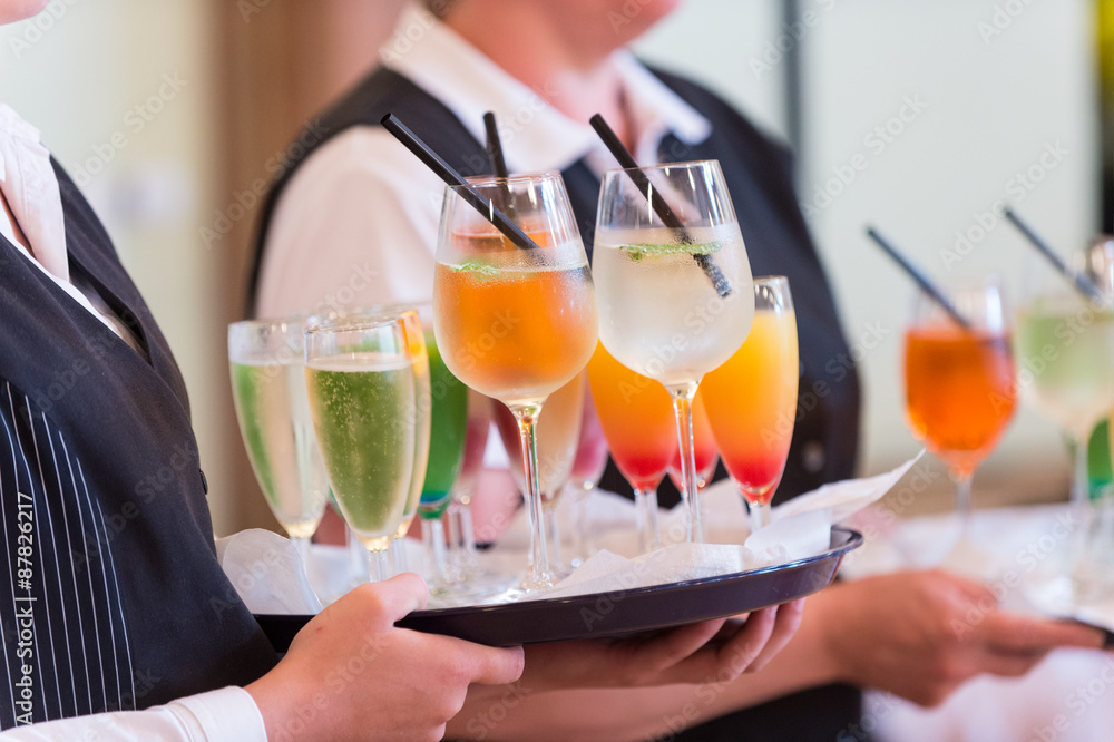 Waiters with serving tray Waiters with serving tray