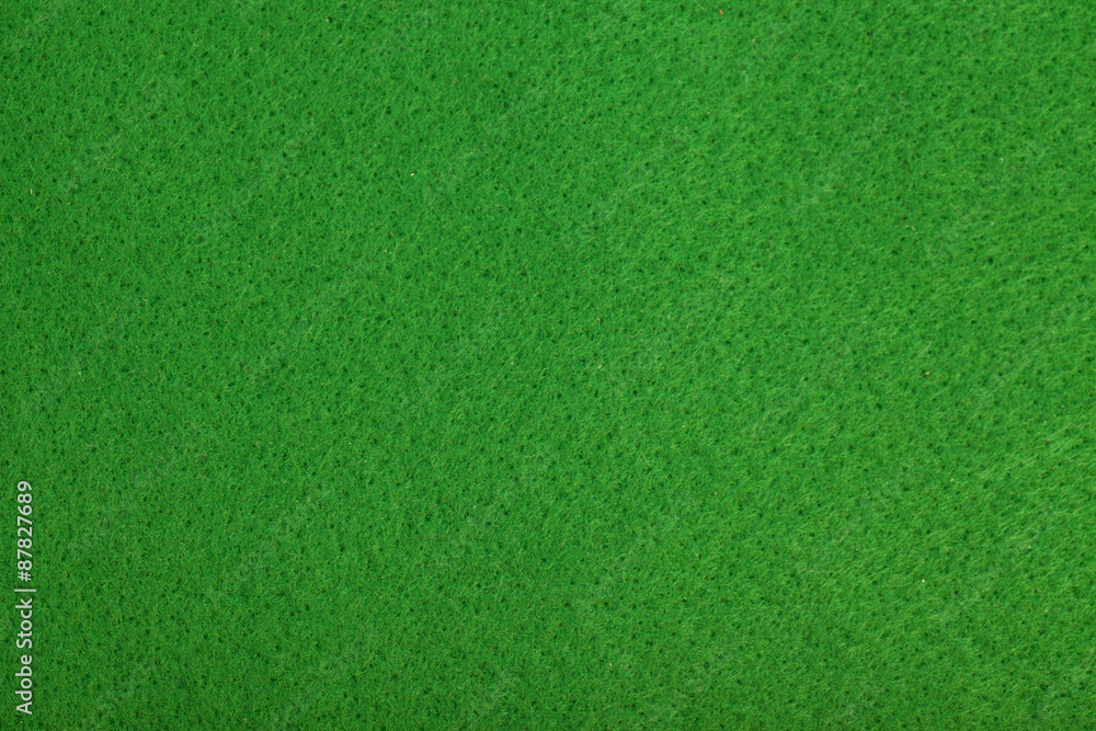 Close-up of green poker table felt background Close-up of green poker table felt background