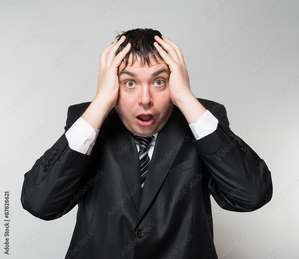 portrait of a young businessman panic fear portrait of a young businessman panic fear