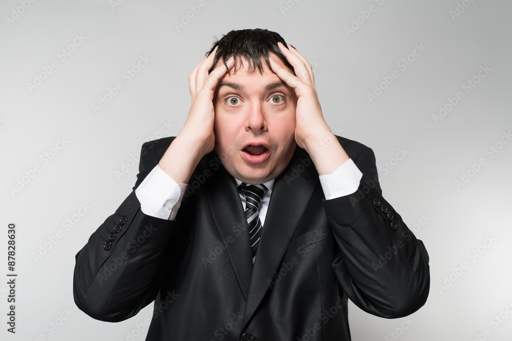portrait of a young businessman panic fear portrait of a young businessman panic fear