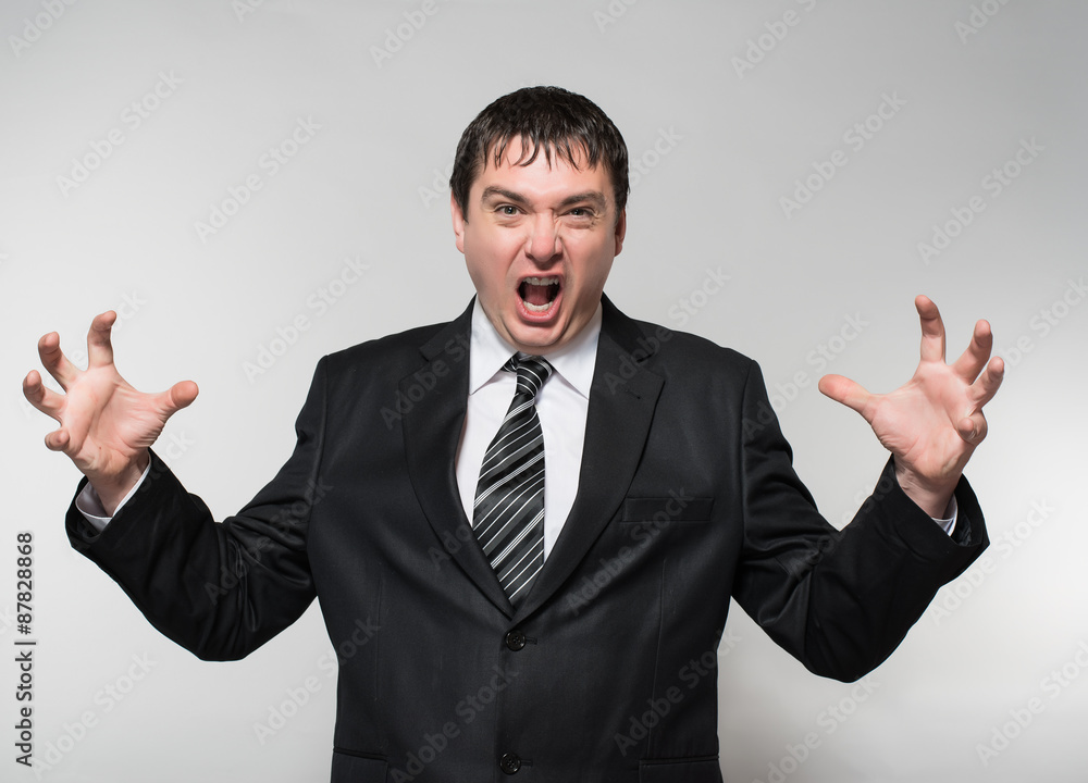 Angry businessman screaming