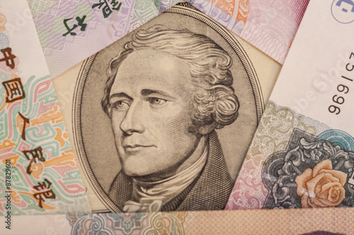 Wallpaper Mural Ten dollar bill surrounded by Chinese Yuan Torontodigital.ca