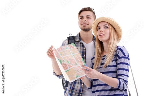 Pair of travelers with map ...