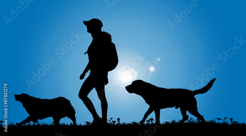 Vector silhouette of a woman with a dog.