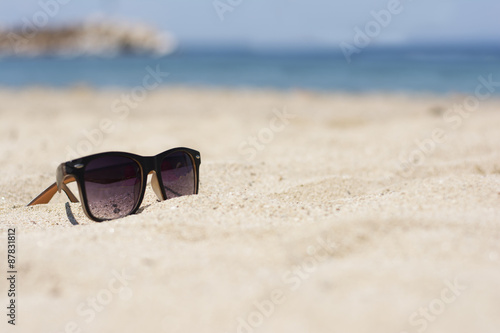 Sun glasses on a beach