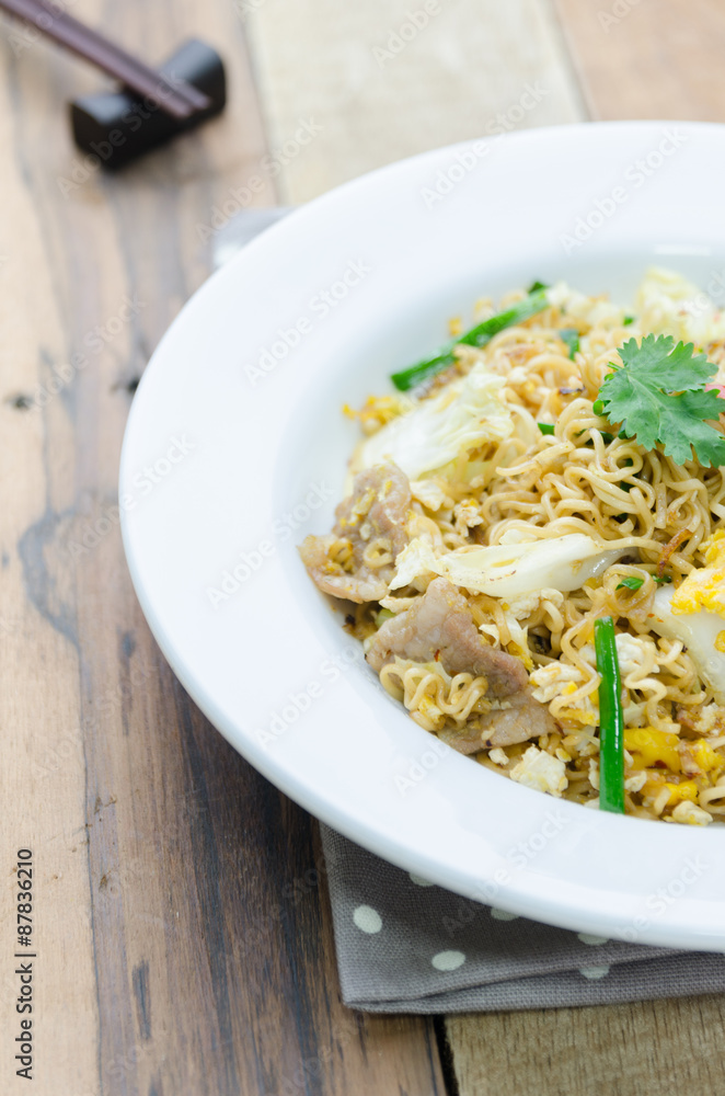 Fire instant noodle on white plate