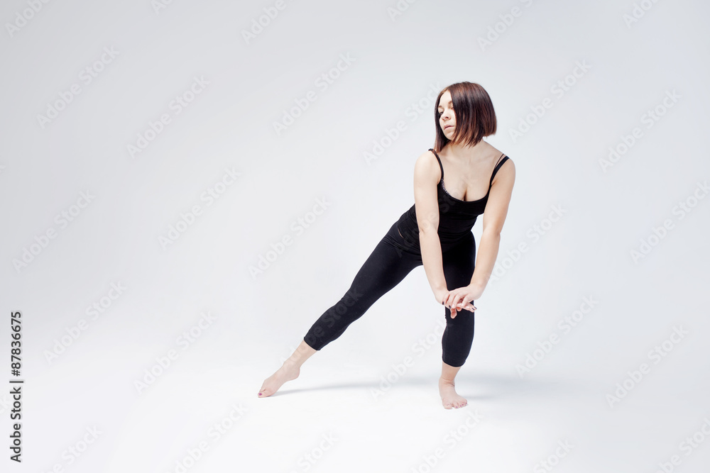 athletic girl posing in Studio, place for your text on the right athletic girl posing in Studio, place for your text on the right