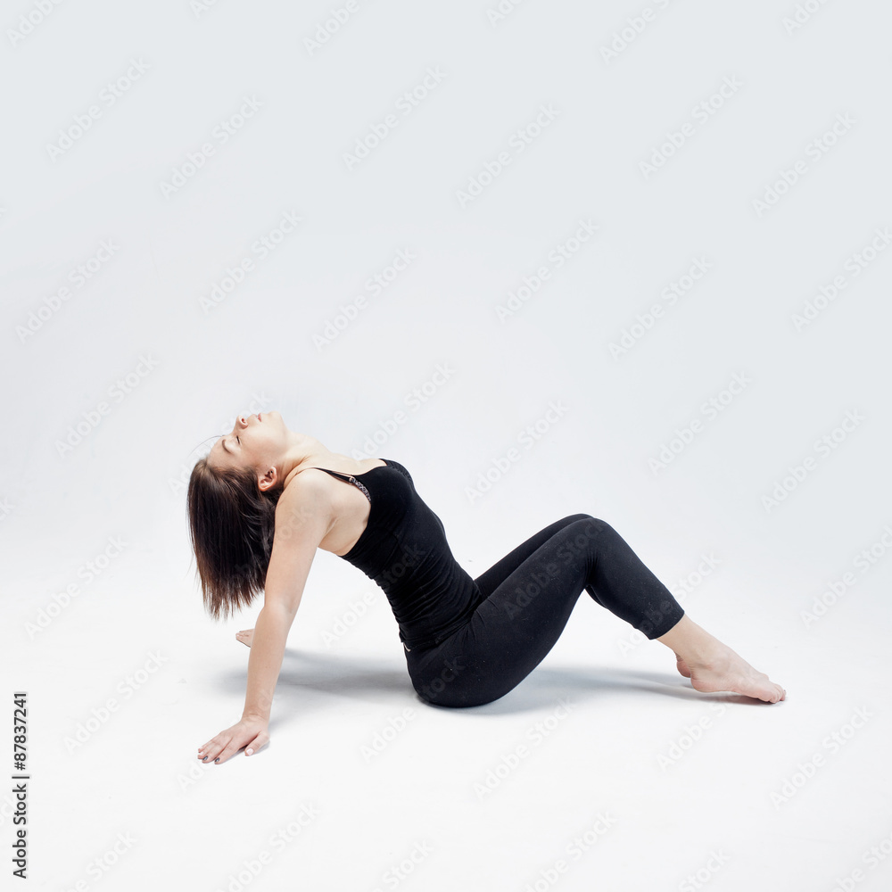 athletic girl posing in Studio, place for your text on the right athletic girl posing in Studio, place for your text on the right