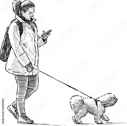 girl and dog on a stroll