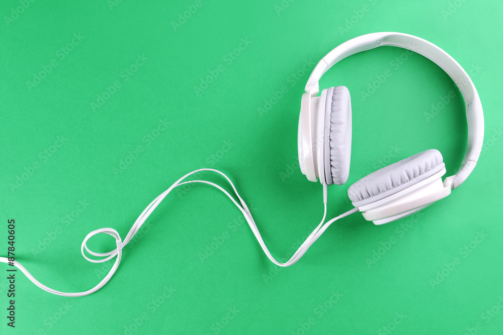 Headphones on green background Headphones on green background
