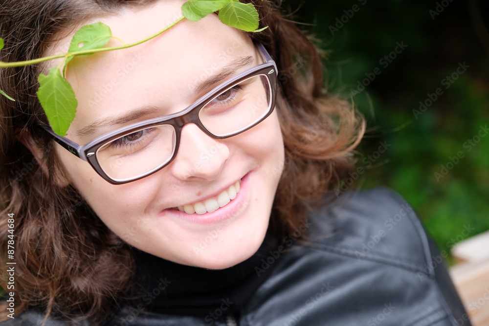 smiling woman in leaves smiling woman in leaves