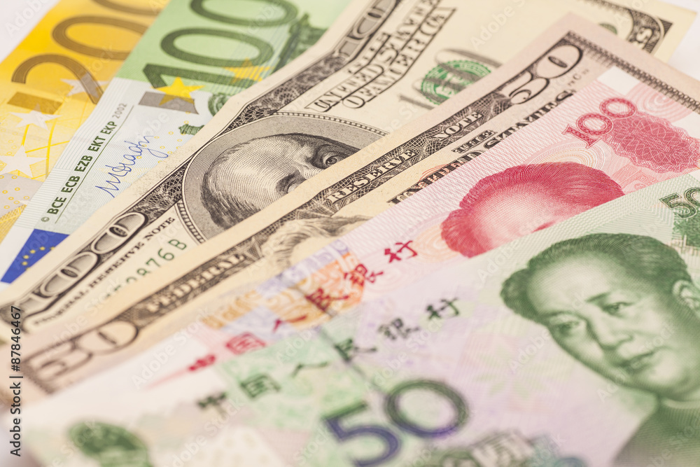 Obraz premium Chinese yuan, European euro notes and American dollars