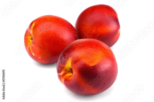 Peach nectarine isolated on a white background