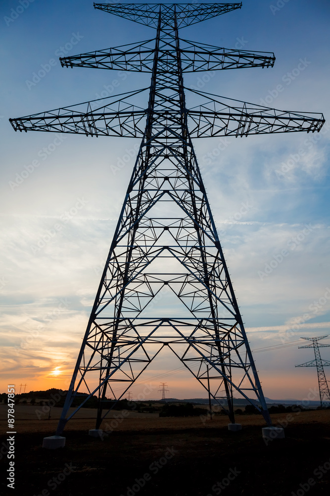 Newly built electricity pylon without wires at dusk