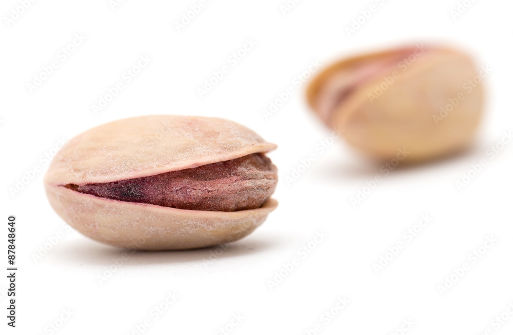 pistachios on a white background. close pistachios on a white background. close