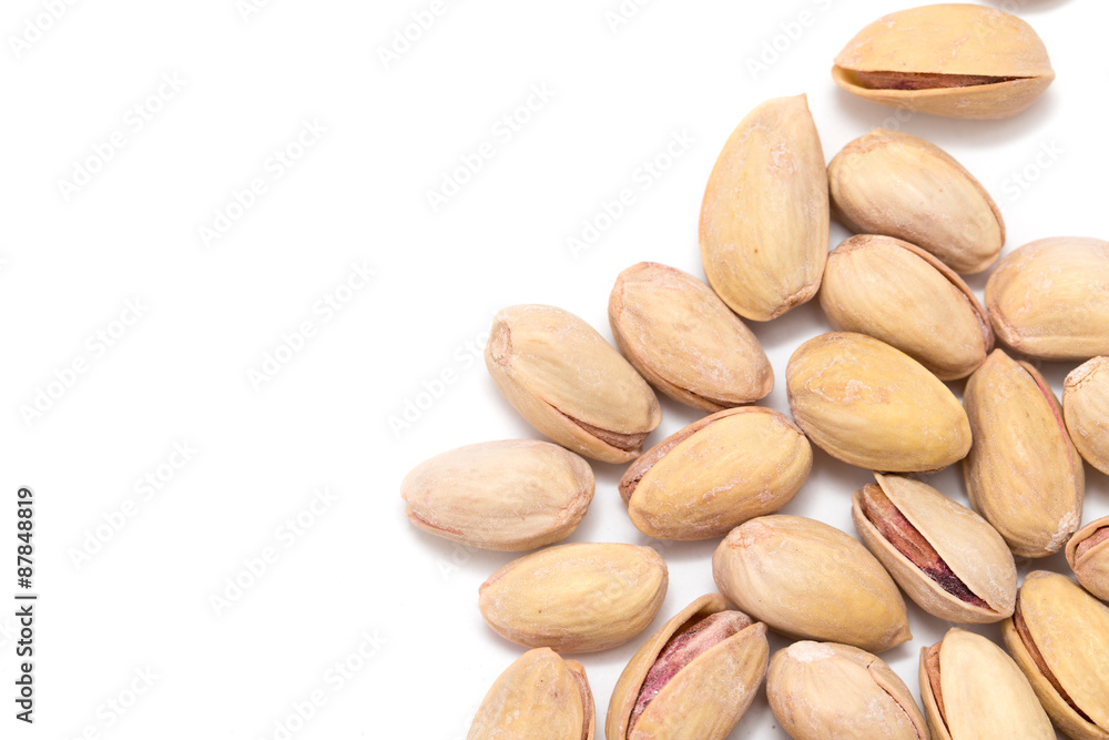 pistachios on a white background. close pistachios on a white background. close